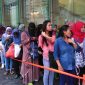 Sejumlah Pekerja Migran Indonesia di Hong Kong sedang mengantre untuk melakukan pemungutan suara pemilu. Foto: Migrant Care