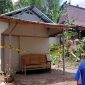 Rumah warga di Desa/Kecamatan Bringin, Kabupaten Ngawi yang menjadi lokasi kematian Suminten dipasangi garis polisi. Foto: Ist