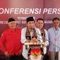 Pasangan Ahmad Dawami dan Sandhika Ratna Ferryantiko (MADIUN MENYALA) dalam konferensi pers usai daftar Cabup-Cawabup di KPU Kabupaten Madiun, Rabu (28/8/2024).