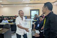 Arnowo Widjaja (baju putih) resmi terpilih sebagai Ketua KONI Kabupaten Madiun. 