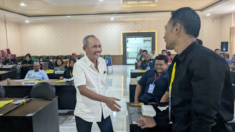 Arnowo Widjaja (baju putih) resmi terpilih sebagai Ketua KONI Kabupaten Madiun. 