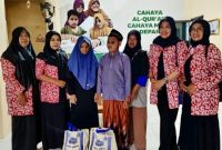 Aksi sosial Tiara Kusuma Ngawi di bulan Ramadan, bagi-bagi sembako dan potong rambut gratis.