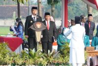 Upacara peringatan Hari Lahir Pancasila di lapangan Desa Ngampel, Kecamatan Mejayan, Kabupaten Madiun, Senin (2/6/2025) pagi.