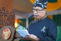 Bupati Madiun membacakan amanat dalam upacara peringatan Hari Jadi ke-458 Kabupaten Madiun di halaman Pendapa Ronggo Djoemeno, Mejayan, Caruban, Sabtu (18/7/2026) pagi. Foto-foto : Prokopim Pemkab Madiun