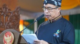 Bupati Madiun membacakan amanat dalam upacara peringatan Hari Jadi ke-458 Kabupaten Madiun di halaman Pendapa Ronggo Djoemeno, Mejayan, Caruban, Sabtu (18/7/2026) pagi. Foto-foto : Prokopim Pemkab Madiun