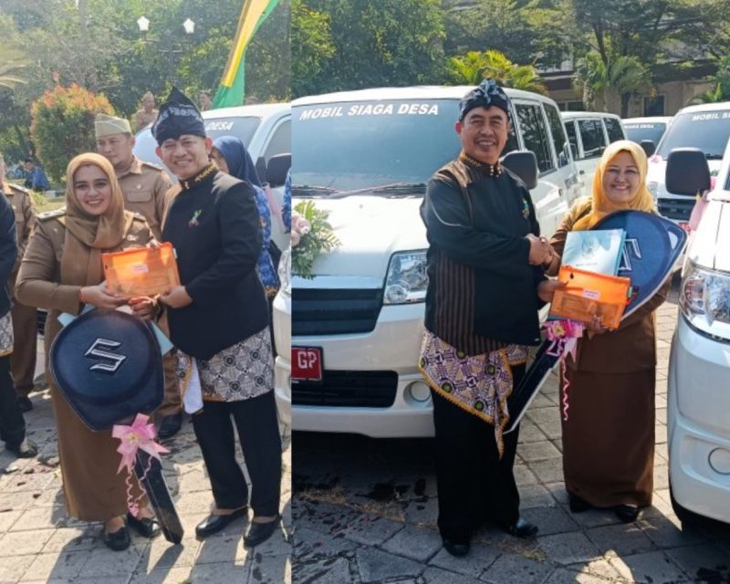 Bupati Madiun Hari Wuryanto (kanan) dan Wakil Bupati Madiun dr. Purnomo Hadi menyerahkan 55 unit Mobil Siaga di Hari Jadi ke-458 Kabupaten Madiun, Sabtu (18/7/2026) 